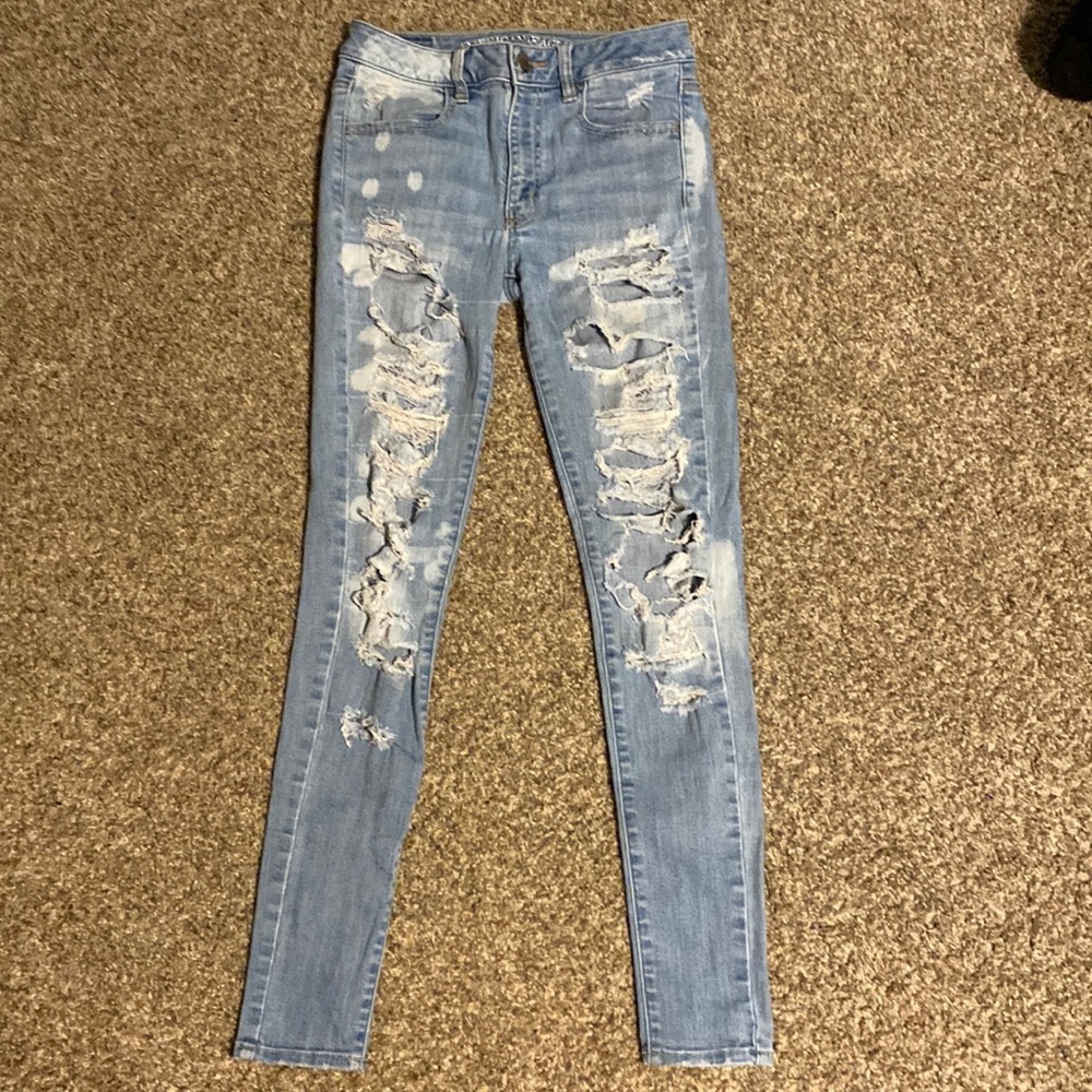 ripped light wash american eagle jeans size 2